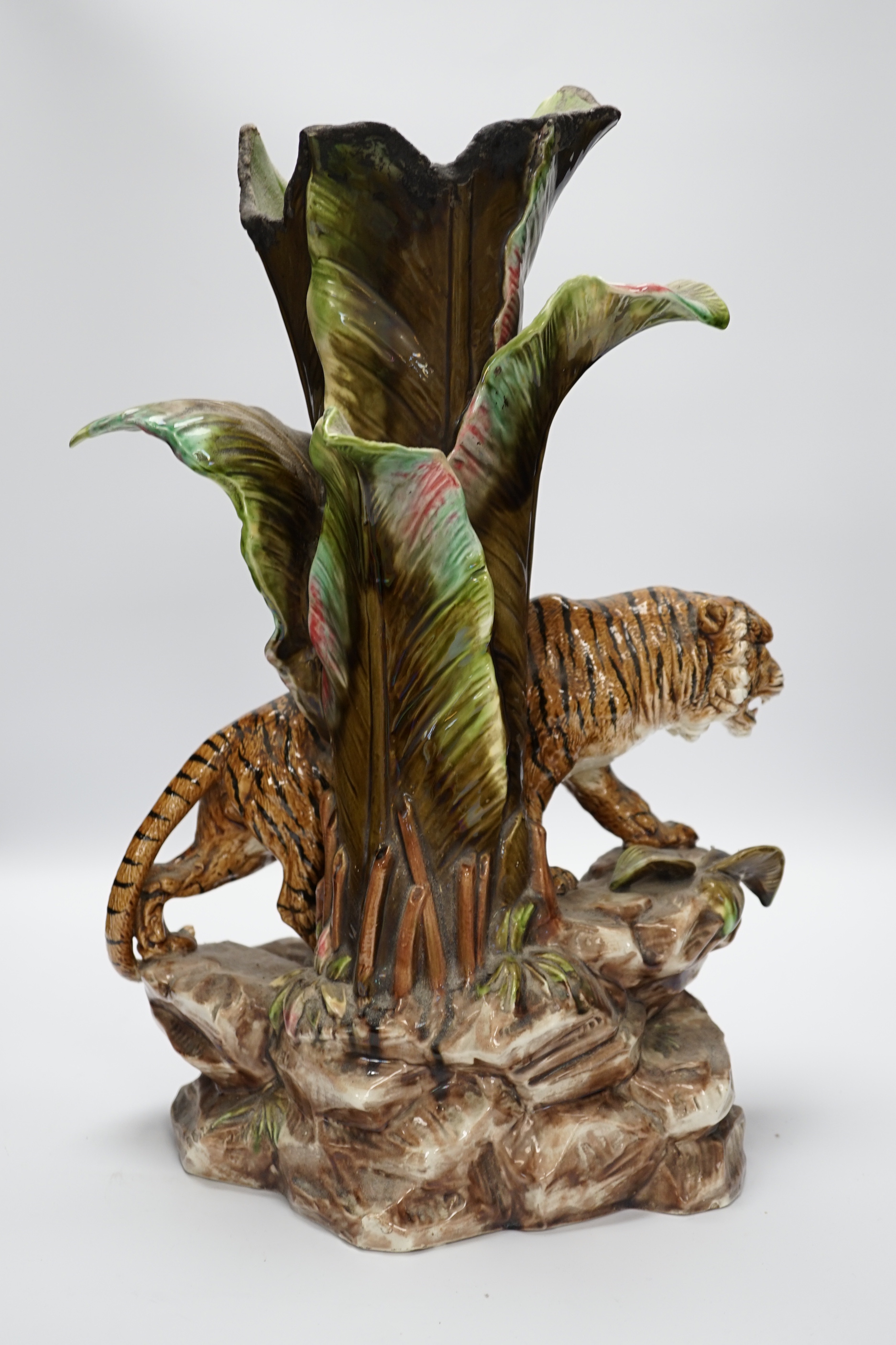 An early 20th century Continental majolica tiger vase, impressed 2032 to the base, 47cm high